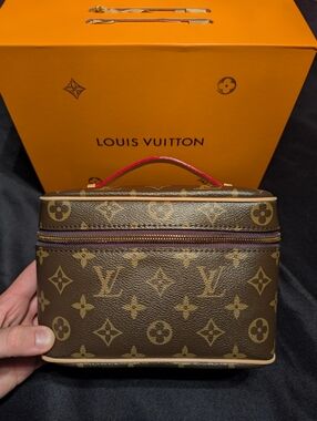 Louis Vuitton Cream Leather Shoulder Bag with Gold Chain and Red Trim.
